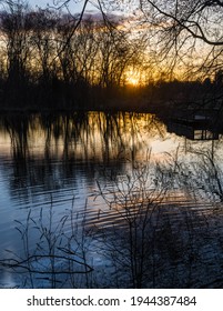The sun setting over a small pond in Big Brook Park in Marlboro New Jersey.