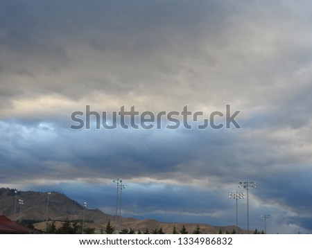 Sun Setting Stormy Clouds