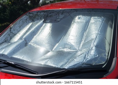 Sun Shade Or Sun Reflector On The Windshield The Car