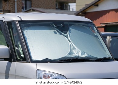 Sun Shade Or Sun Reflector On The Windshield The Car