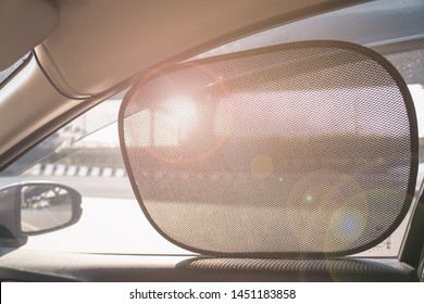 Sun Shade Of Side Window Car In Warm Day Time