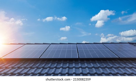 Sun Shines Brightly On Modern Photovoltaic System On Roof Of House