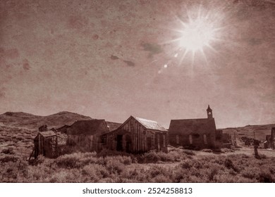 The sun shines brightly over the ghost town of Bodie, California, casting light on the abandoned wooden buildings of this 19th-century mining town preserved at Bodie State Historic Park.