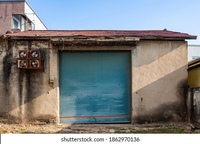 The Sun Shines On An Old Warehouse Building