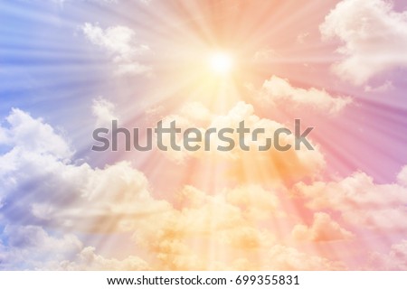 The sun shines on the pastel sky for background