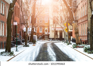 Sun Shines On Snow Covered Commerce Street After A Winter Storm In Greenwich Village Manhattan New York City