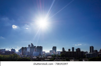 The Sun Shines On Sunny Blue Sky In The City