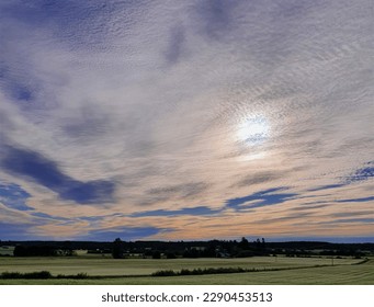 Sun Shining Through The Clouds
