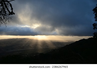 sun shining through the clouds