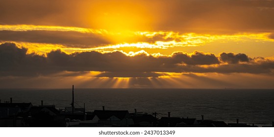Sun shining through the clouds