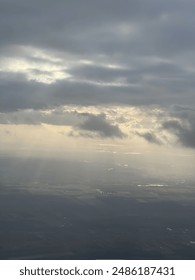 Sun shining through the clouds
