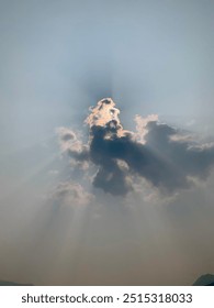Sun shining through the clouds