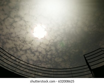 Sun shining through the clouds