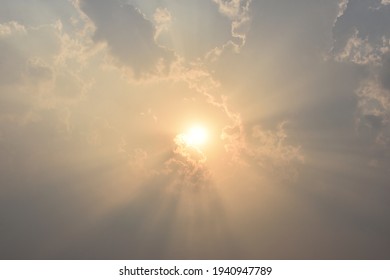 sun shining through the clouds makes a beautiful sight 