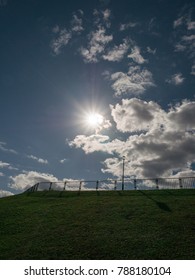 The Sun Shining Through The Clouds in a Public Park in Otaru , Hokkaido