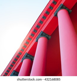 Sun shining through columns