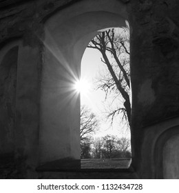 Sun shining through a window at the Björkvik church ruin in Sweden