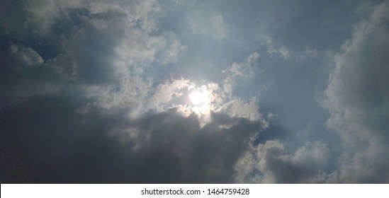 the sun shone in the clouds