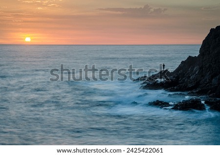 Sun sinking below the horizon on Fuerteventura Canary Islands