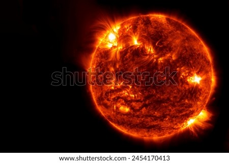 The sun from space on a dark background. Elements of this image furnished by NASA. High quality photo
