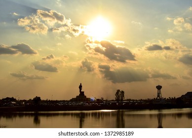 The sun, two light passes before the clouds above Phutthamonthon Khon Kaen