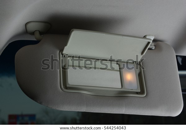 Sun visor with mirror in a\
car\
