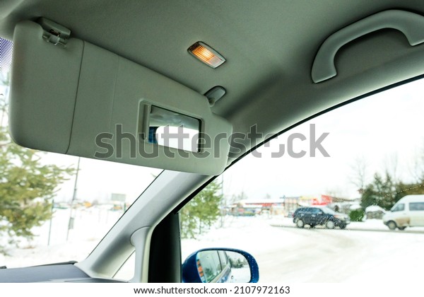 Sun visors for the car interior with a new\
sliding mirror and\
lighting.