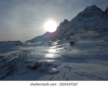 sun in winter mountains