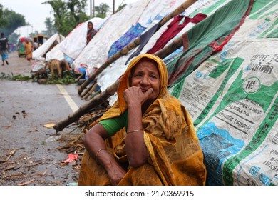 Sunamganj, Sylhet Division, Bangladesh - 21 June 2022: Flood-affected people have taken shelter on the side of the road.