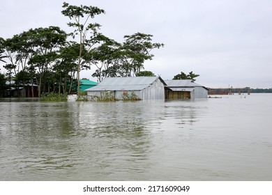 Sunamganj, Sylhet Division , Bangladesh on 18 June 2022. Due to heavy rains, the lower part of Sylhet has turned into a flood. Houses submerged in flood waters.