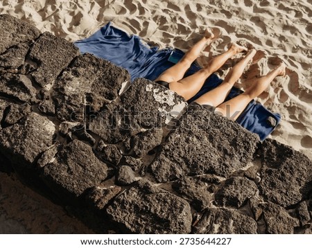 Sunbathing on the beach during summer vacation, relaxing holiday concept with warm sunlight, leisure time, travel freedom and seaside lifestyle atmosphere