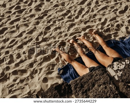 Sunbathing on the beach during summer vacation, relaxing holiday concept with warm sunlight, leisure time, travel freedom and seaside lifestyle atmosphere