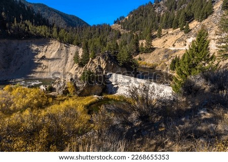 Sunbeam dam remains in Yankee Fork of the Jordan Creek in Idaho in sunny autumn day