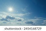 Sunbeam With Haze On Blue Sky. Beams With Clouds. Sky With Sun Coming With Clouds.