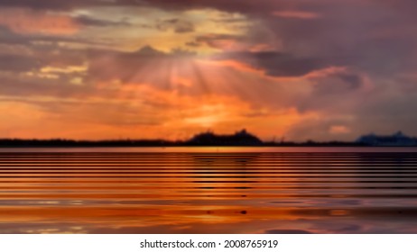 sunbeam on dramatic sunset orange gold lilac clouds on dark sky sunbeam sea wave light reflection seascape landscape Baltic on horizon boat