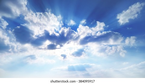 sunbeams break through the clouds