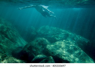 Sunbeams in rock pool