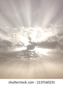 The Sunbeams of the Sun Backlighting the Clouds Silver