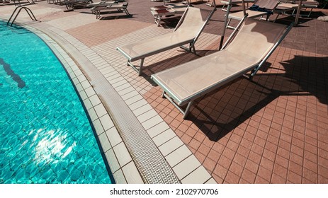 Sunbed. Summer Resort Chair, Relax Lounge At Luxury Hotel Pool. Beach Lounger Chaise. Vacation Sea Rest Sun Tan Concept.