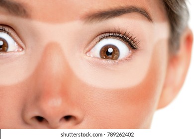 Sunburn tan lines of sunglasses, red painful skin. Scared Asian woman shocked with funny expression forgot to put sunscreen on face on summer vacation. Suntan skin cancer facial care concept. - Shutterstock ID 789262402