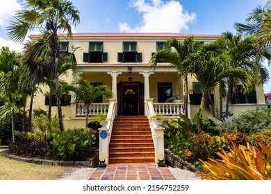 Sunbury, Barbados -2022: Sunbury Plantation House. Restored Great House From Gentry Time Of Sugar Barons. Built In 1600s By Matthew Chapman An Early Settler. Front Exterior, Porch, Jalousie Shutters.