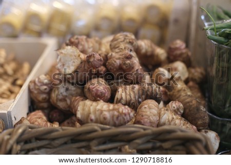 Sunchoke, jerusalem artichokes, Topinambour. Vegetables fresh root at the farmers market. [[stock_photo]] © 