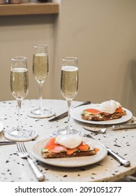 Sunday Brunch With Prosecco And Eggs And Salmon Bruschetta On Marble Table At Home On Kitchen