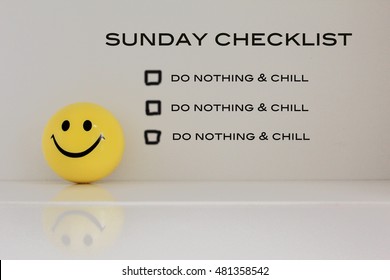Sunday checklist with smiley face ball- Vintage soft light filter effect