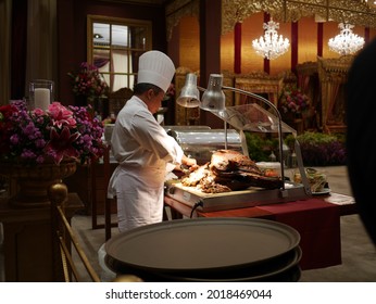 Sunday, October 25, 2015. A Chef Was Slicing A Meat In A Five Stars Hotel At South Jakarta, Indonesia.