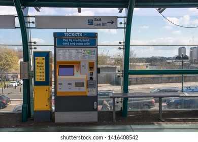 Sunderland - Great Britain / April 13, 2019 : Modern Glass Metro Light Railway Station Building With Ticket Machine And Help Point