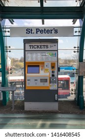 Sunderland - Great Britain / April 13, 2019 : Modern Glass Metro Light Railway Station Building With Ticket Machine And Help Point