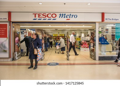 Sunderland - Great Britain / April 13, 2019 : Entrance To Tesco Metro Food And Grocery Supermarket Showing Sign, Signage, Logo And Branding Above Door