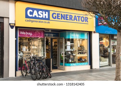 Sunderland / Great Britain - February 19, 2019 : Exterior Shot Of Cash Generator Pawn Shop With Electronics, Jewelry And Bikes On Display