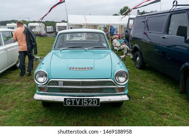 Sunderland, UK - 28th July 2019: FORD classic and vintage car show at the Sunderland air show. Traditional elegant retro style design car, muscle car, horse power. Retro concept background.